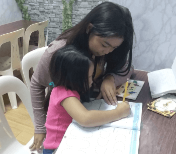 Center-based tutorials: Teacher Myra with student Danika Singh